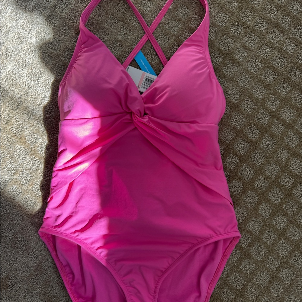 Gorgeous, new, with tags, pink, one piece! Very flattering!
